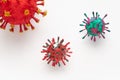 A photograph of a collection of three colorful 3D Virus artwork model forms inspired by the Covid-19 lockdown of 2020