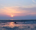 Sunrise with Golden Sun and its Reflection in Water and Colorful Sky - Vijaynagar Beach, Havelock Island, Andaman, India Royalty Free Stock Photo