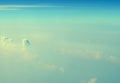 Cumulonimbus and Stratiform Clouds in Infinite Blue Sky with Shades of Green - Aerial View - Abstract Natural Background Royalty Free Stock Photo