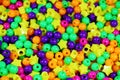 A photograph depicting many different colorful beads of different shapes Royalty Free Stock Photo