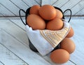 photograph of Eggs close up inside a bucket