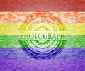 Photograph emblem on mosaic background with the colors of the LGBT flag