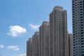 Line of Concrete Skyscrapers in a Modern Cityscape