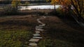 A flagstone pathway towards the lake