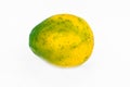 Photograph of a fresh green yellow medium sized papaya fruit isolated on a white background Royalty Free Stock Photo