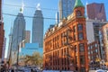 Gooderham Flatiron Building with CN Tower, at Downtown Toronto, Ontario, Canada.