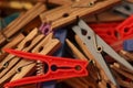 This is a photograph of a group of differently colored clothes pegs.