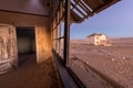 An abandoned house in the ghost town of Kolmanskop Royalty Free Stock Photo