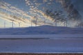 Photograph of Wind Turbines on a hill ridge line around Lake George in Australia Royalty Free Stock Photo