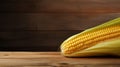 Photograph of Maize (Corn) Grain on Wood Background with Copy Space