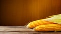 Photograph of Maize (Corn) Grain on Wood Background with Copy Space