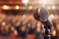 A photograph with the microphone in focus above the lecture hall lectern. Generative AI