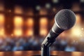 A photograph with the microphone in focus above the lecture hall lectern. Generative AI