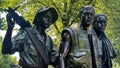 Photograph of the monument and bronze statue of the three soldiers, Vietnam Veterans Memorial on the National Mall.