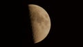 Photograph of Moon in the first quarter lunar phase Royalty Free Stock Photo