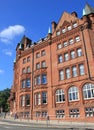 Photograph of orange brick building in central Norwich