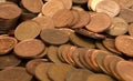 A pile of Canadian one cent coins and United States pennies Royalty Free Stock Photo