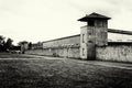 Retouched photograph of the Sachsenhausen Concentration Camp, where two sentries of the SS guards can be seen.