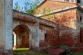 Photograph of the ruins of an abandoned red brick church