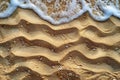 Photograph of sand texture background, top view of beach sand with small waves Royalty Free Stock Photo