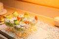 Savory Delight: Fresh Salad Presentation in Glass Bowls