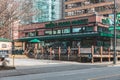 The photograph showcases the prominent Whole Foods Store located on Robson Street in Vancouver