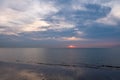 Subdued Sunset over Calm Seashore