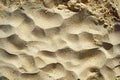 Photograph showcasing photograph of sand texture background, top view of beach sand with small waves Royalty Free Stock Photo