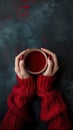 Top View of Womans Hands Holding a Hot Red Mug