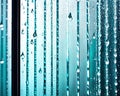 A photograph of a shower curtain with water droplets on it. Royalty Free Stock Photo