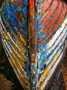 Underside of old boat with peeling paint