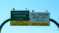 Inspection signs on the interstate in Texas.