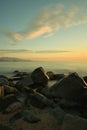 Photograph of some rocks on a beach in Barcelona