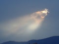 Sunbeam ouverture in a cloudy sky Royalty Free Stock Photo