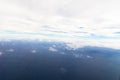 Photograph taken above the clouds over the Ocean. Royalty Free Stock Photo