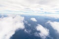 Photograph taken above the clouds over the Ocean. Royalty Free Stock Photo
