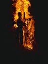 Photograph taken at a fire bonfire with a cross silhouette