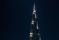 Burj Khalifa tower at night with sky full of stars, Dubai