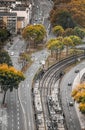 Trees between roads in the center of Coln Royalty Free Stock Photo