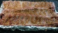 Pork ribs with dry rub ready for the oven. Royalty Free Stock Photo