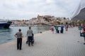 Visitors arriving to port of Ibiza boarding place for the ferry trips to other islands