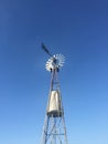 Photograph of a windmill in the field