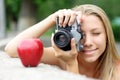Photographer and apple Royalty Free Stock Photo