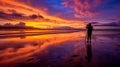 photographer capturing the moment of sunset on the ocean.