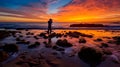 photographer capturing the moment of sunset on the ocean.