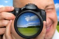 Photographer capturing rural landscape Royalty Free Stock Photo