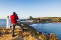 Photographer at Castlepoint Lighthouse New Zealand