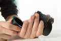 Photographer checking lens Royalty Free Stock Photo