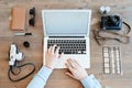 Photographer checking shoots on laptop Royalty Free Stock Photo