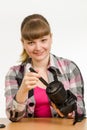 Photographer cleans front of the lens on the camera and looked into the frame